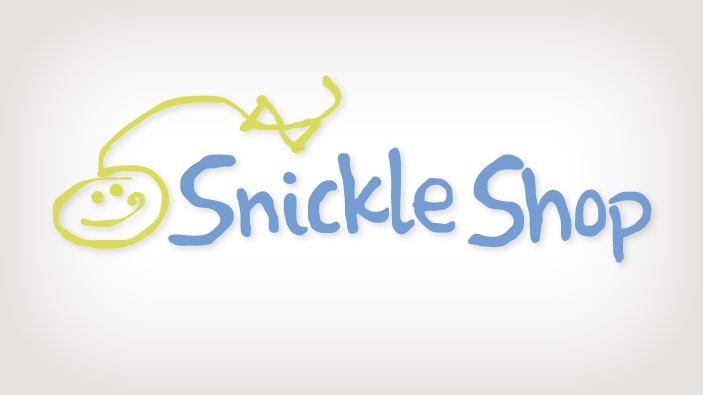 Logo design for the Snickle Shop with a handwritten, blue font. There is a hand drawing of a child smiling with a long line and a bow trailing away in green.