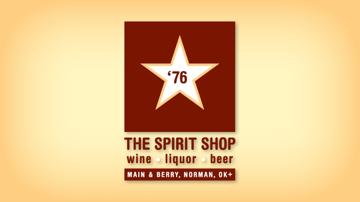Logo design for The Spirit Shop featuring a white star with a gold border in a red box. There is a 76 inside the star to denote the year 1976. The Spirit Shop is under the red box. Under that are the words wine, liquor and beer. Under that, are the words 